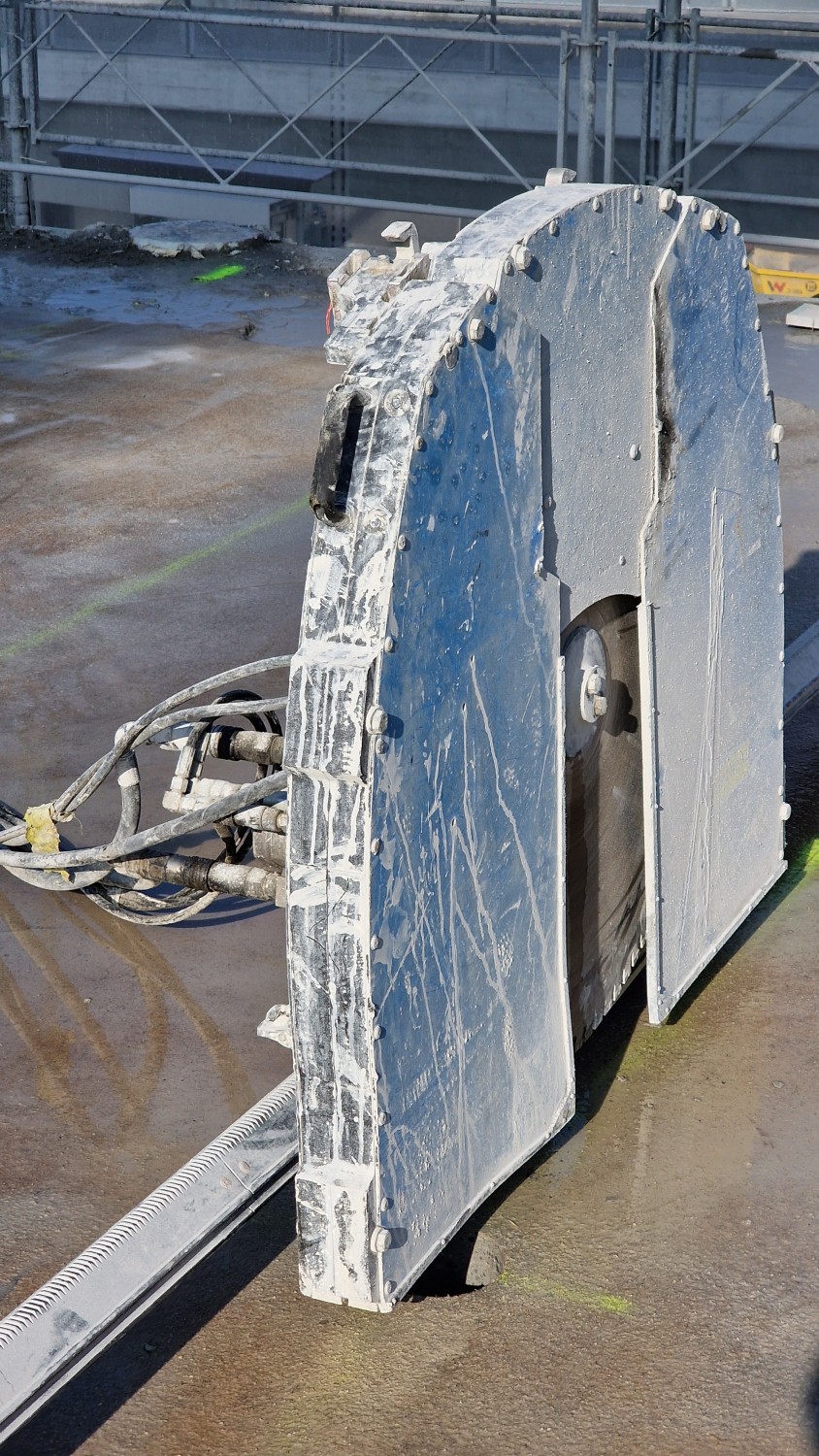 Saw equipment beside the cut concrete elements.
